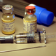 Vials of smallpox vaccine sit on a counter before a vaccination December 16, 2002 at Mid-Florida Biologicals in Altamonte Springs, Florida